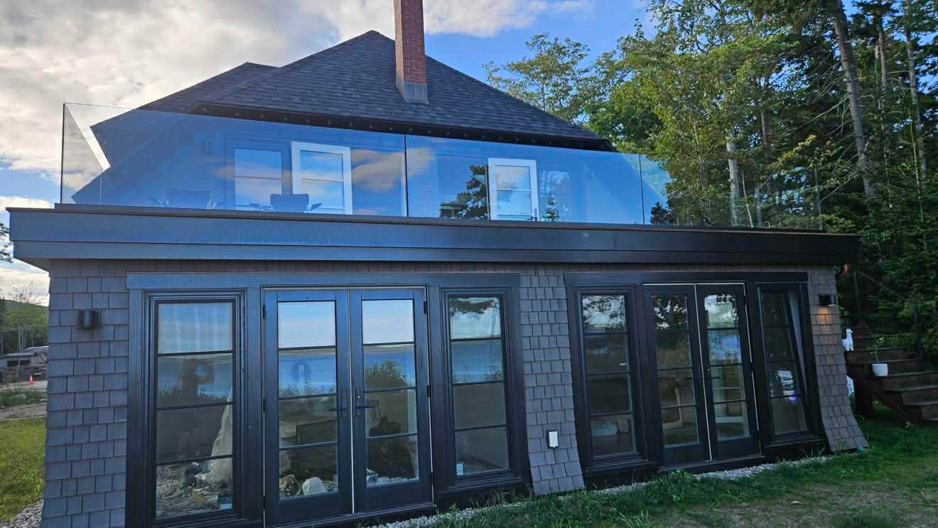 Modern coastal home with dark trim
